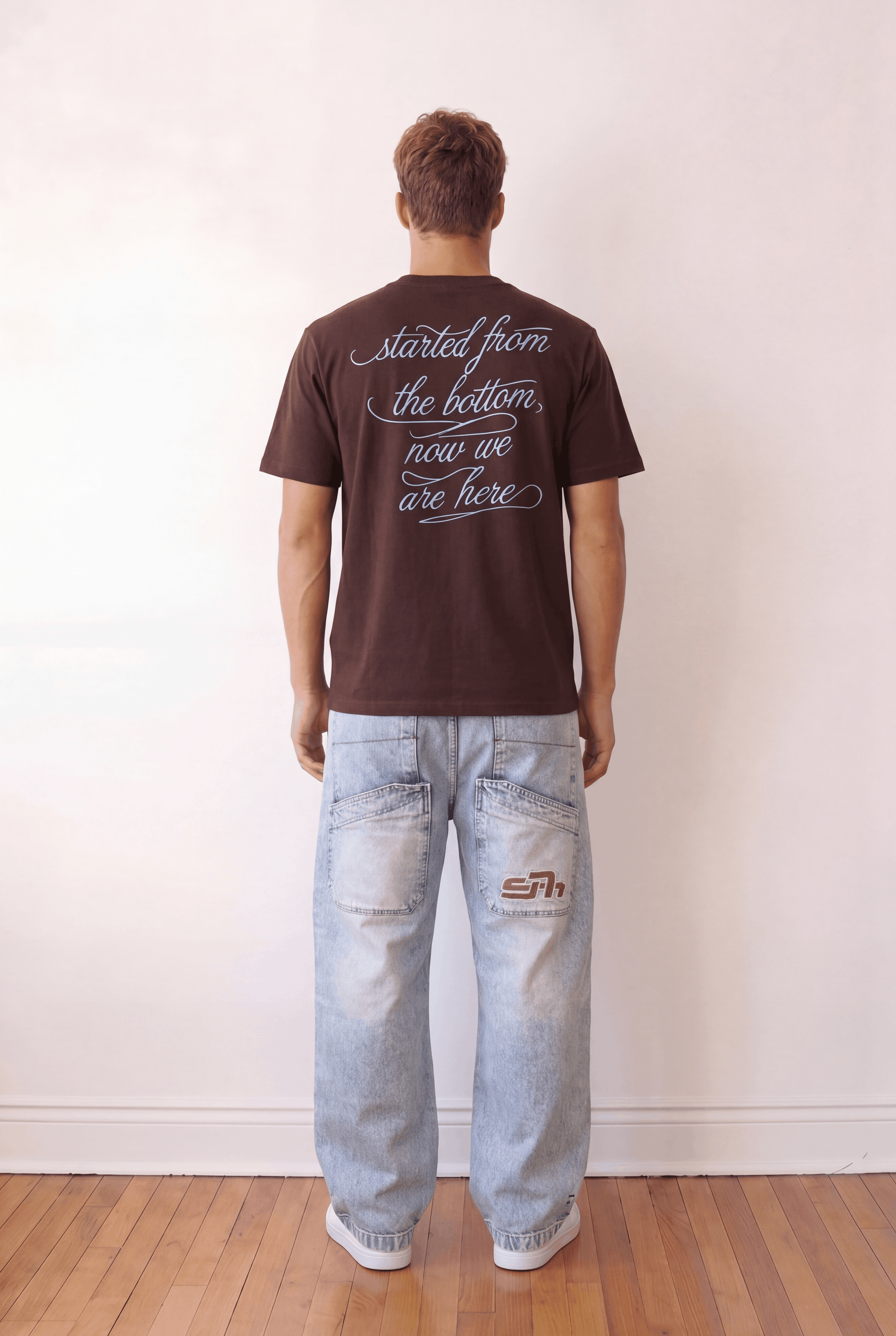 Dark brown embossed seven Tshirt