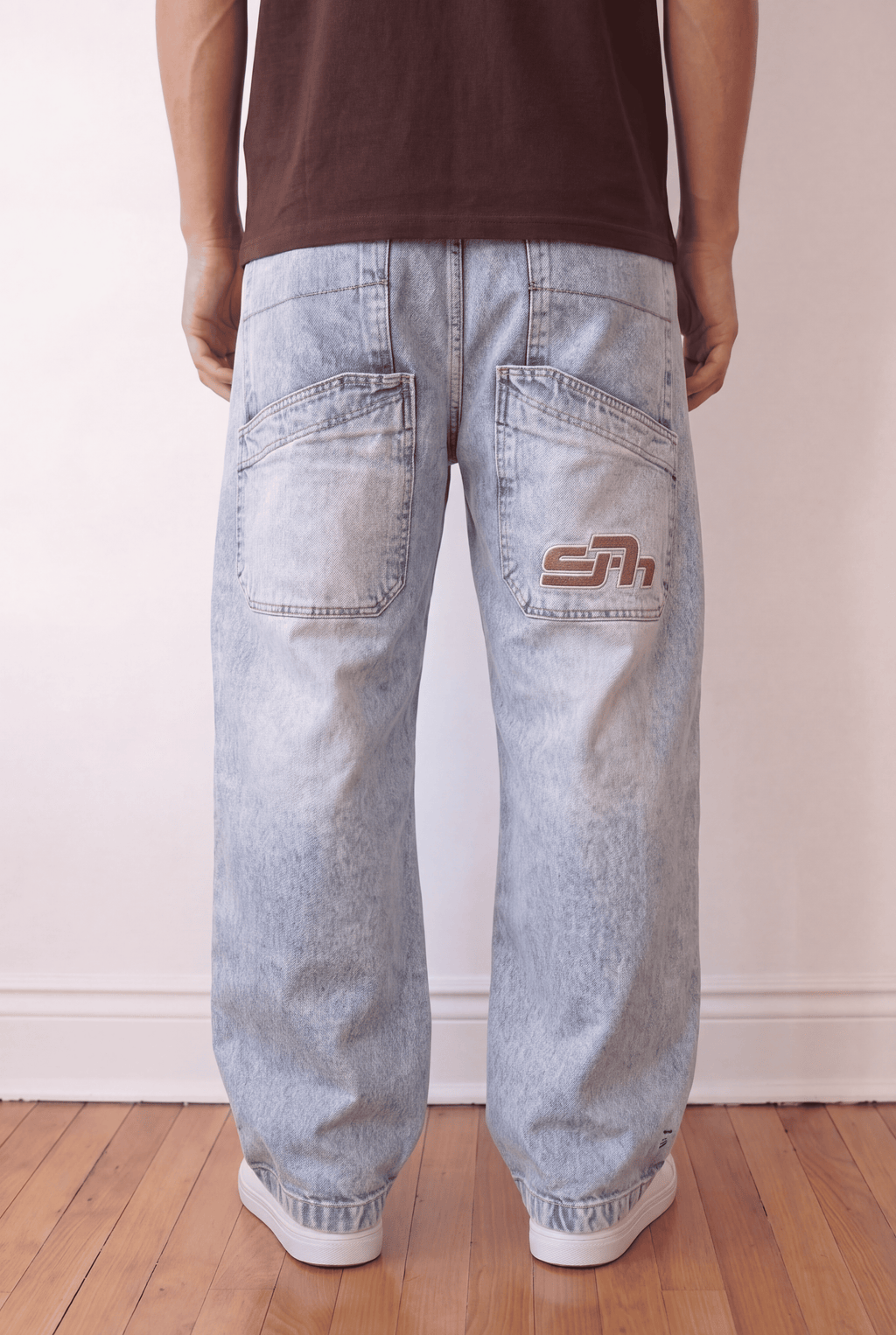 Light blue embroidered seven baggy jeans