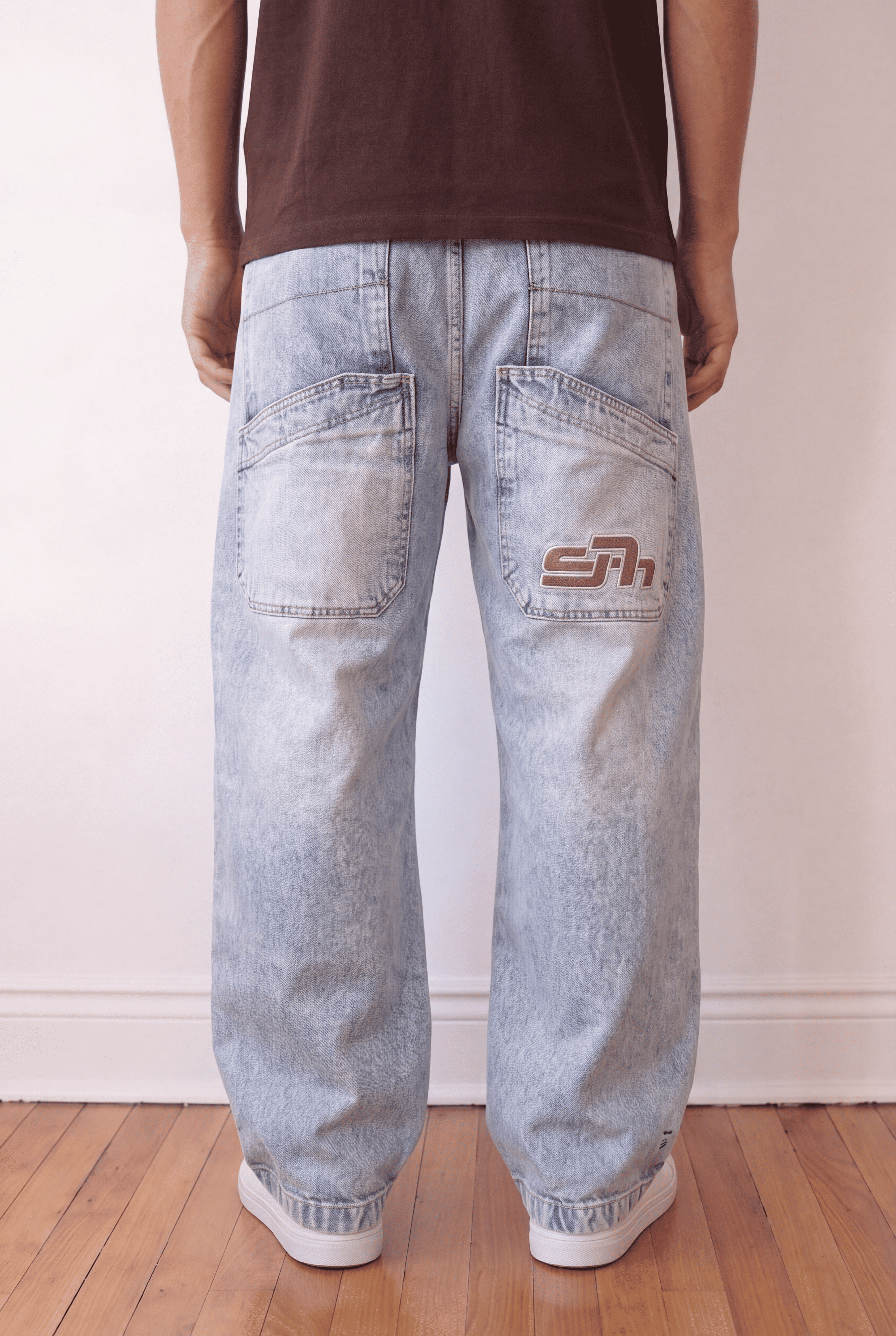 Light blue embroidered seven baggy jeans